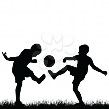 Silhouettes of children playing football