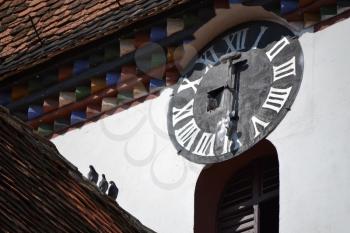 Old clock tower in a church from Saliste Romania