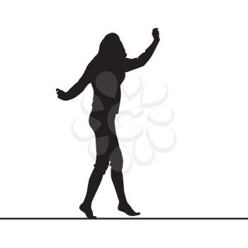 Woman silhouette balancing on slackline
