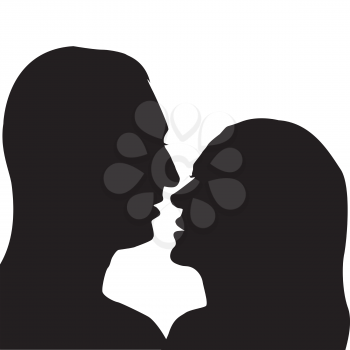 Silhouettes of man and woman preparing for a kiss