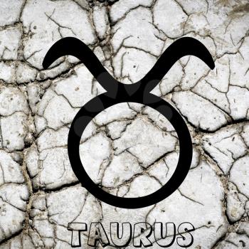 Taurus zodiac sign on earth element background