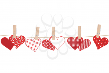 Hearts and clothes pegs on rope 