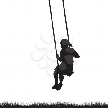 Child having fun on a swing outdoor