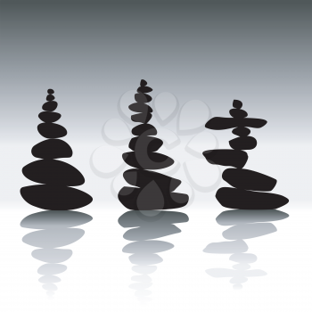Relax zen stones balanced. Black pebbles isolated with shadows