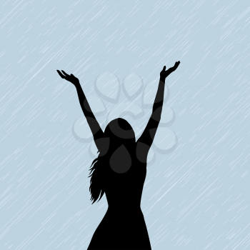 Silhouette of a woman hwo enjoy the rain