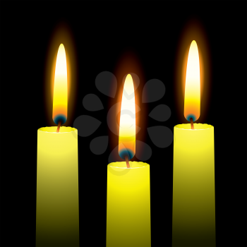 Royalty Free Clipart Image of Three Yellow Candles