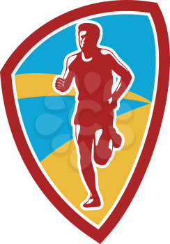 Illustration of marathon triathlete runner running facing front view set inside shield crest on isolated done in retro style.