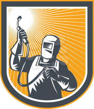 Illustration of welder fabricator worker holding up welding torch viewed from front set inside shield on isolated background done in retro style.