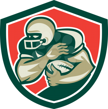 Illustration of an american football gridiron player running back with ball facing front fending set inside shield crest done in retro style.