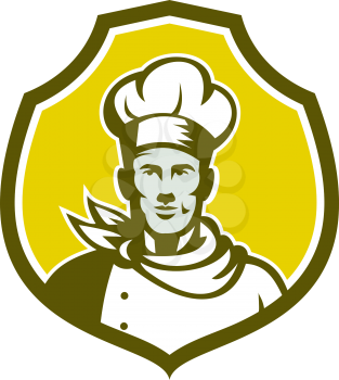 Illustration of a baker chef cook bust with hat facing front set inside shield crest on isolated background done in retro style. 