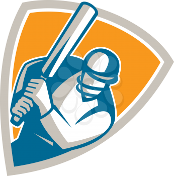Illustration of a cricket player batsman with bat batting set inside shield crest on isolated background done in retro style. 