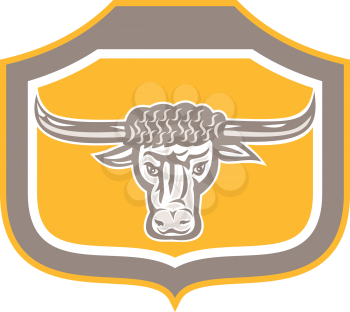 Illustration of an bull head snorting facing front set inside crest shield done in retro style on isolated background. 