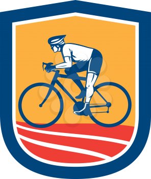 Illustration of a cyclist riding racing bicycle cycling side view set inside shield crest done in retro style.