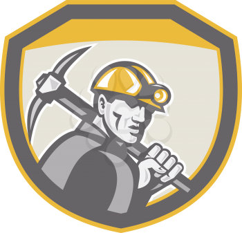 Illustration of a coal miner hardhat holding pick axe inside a shield done in retro style.