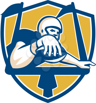 Illustration of an american football gridiron player receiver with ball scoring touchdown under the goal post set inside shield crest done in retro style.