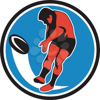 Illustration of a rugby player kicking ball front view set inside circle on isolated background done in retro style.