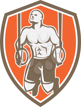 Illustration of a crossfit athlete body weight exercise hanging on gymnastic ring dip kipping muscle up facing front inside shield crest done in retro style on isolated white background