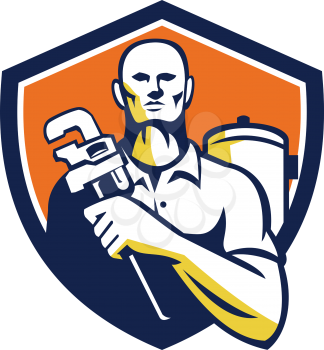 Illustration of a plumber holding monkey wrench viewed from front set inside shield crest on isolated background done in retro style. 