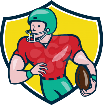 Illustration of an american football gridiron wide receiver player running with ball looking to the side viewed from front set inside circle on isolated background done in cartoon style.