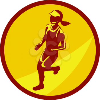 Illustration of marathon runner running viewed from the side set inside circle on isolated background done in retro style.
