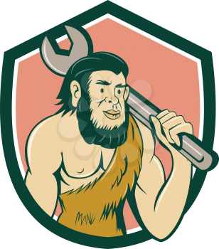 Illustration of a neanderthal man or caveman carrying spanner on shoulder set inside crest on isolated background done in cartoon style.