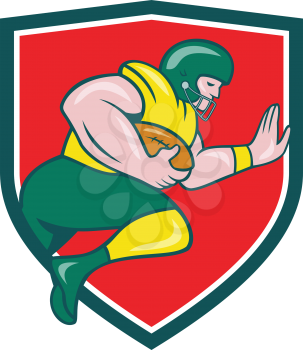 Illustration of an american football gridiron player running back charging with ball viewed from the side set inside shield crest on isolated background done in cartoon style. 