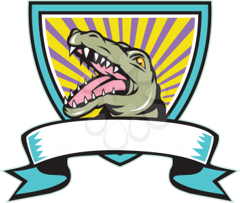 Illustration of an angry gator alligator crocodile head snout snapping set inside crest shield with ribbon scroll in front done in retro style on isolated background.