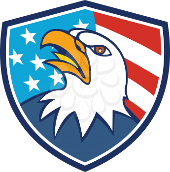Illustration of an american bald eagle head looking up viewed from side set inside shield crest with usa flag stars and stripes in the background done in cartoon style. 