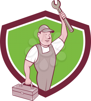 Illustration of a mechanic wearing hat and overalls lifting raising up spanner wrench holding toolbox looking to the side viewed from front set inside shield crest on isolated background done in carto