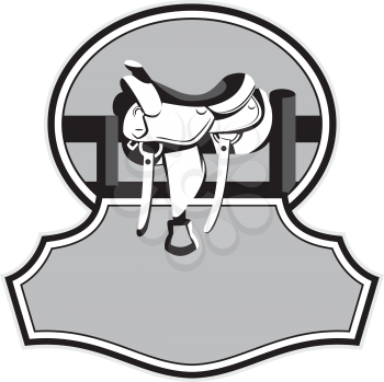 Illustration of a modern western saddle on ranch fence set inside oval shape with banner in front in black and white done in retro style. 