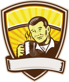 Illustration of an asian man holding cup mug drinking coffee viewed from front set inside shield crest with sunburst in the background done in retro woodcut style. 