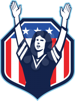Illustration of a female american football fan with hands raised up viewed from front set inside shield crest with american usa stars and stripes flag in the background done in retro style. 