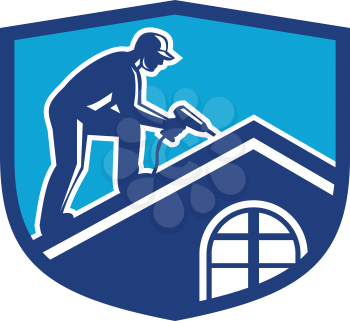 Illustration of a roofer construction worker wearing hat working on roof with hand drill viewed from the side set inside shield crest done in retro style. 
