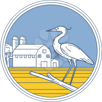 Illustration of a great blue heron perched on a branch viewed from the side set inside circle with barn farm silo in the background done in retro style. 