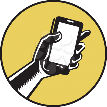 Illustration of a hand holding smartphone set inside circle on isolated background done in retro woodcut style. 