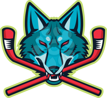 Sports mascot icon illustration of head of a coyote or gray wolf biting a crossed hockey stick viewed from front on isolated background in retro style.