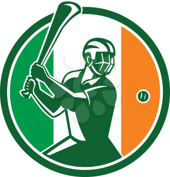 Icon retro style illustration of athlete or player playing Hurling, a Gaelic Irish sport,  striking sliothar ball with hurley wooden stick viewed from side set inside circle with Ireland Irish flag.