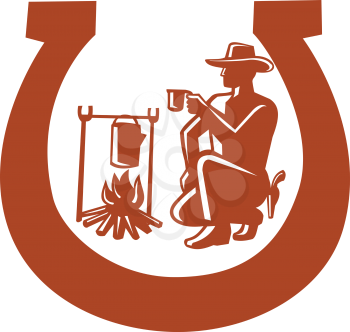 Mascot icon illustration of a cowboy drinking coffee beside campfire set inside horseshoe viewed from side on isolated background in retro style.