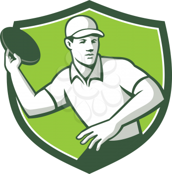 Mascot icon illustration  of an disc golf player throwing a flatball or frisbee set inside crest or shield shape viewed from front on isolated background in retro style.