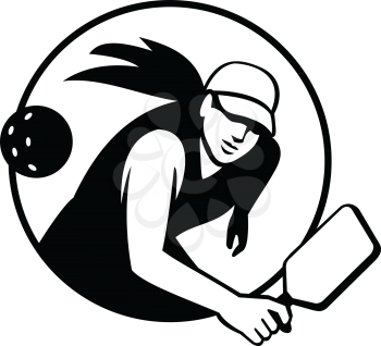 Retro style illustration of a female pickleball player, a paddleball sport that combines elements of tennis, badminton, and table tennis set in circle isolated background done in black and white.