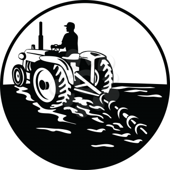 Illustration of a farmer gardener driving a vintage tractor plowing mowing viewed from rear set inside circle on isolated background done in retro black and white style. 