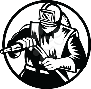Black and white illustration of a sandblaster worker holding sandblasting hose wearing helmet visor front view set inside circle on isolated background done in retro style.