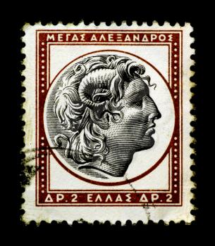 Royalty Free Photo of Alexander the Great on Greek stamp isolated in black