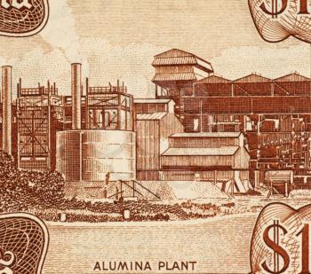 Royalty Free Photo of an Aluminium Plant on 10 Dollars 1992 Banknote from Guyana.