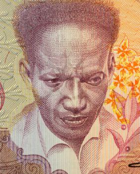 Royalty Free Photo of Anton de Kom on 100 Gulden 1988 Banknote from Suriname. Resistance fighter and anti-colonialist author.