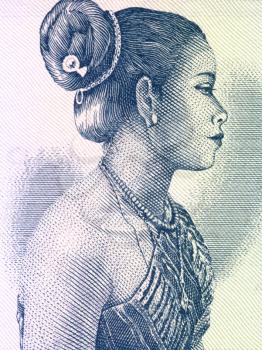 Royalty Free Photo of a Beautiful Woman on 10 Kip 1962 Banknote from Laos