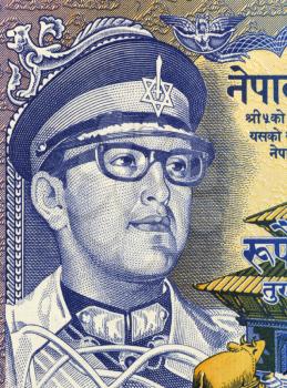 Royalty Free Photo of Birendra Bir Bikram (1945-2001) on 1 Rupee 1974 Banknote from Nepal. King of Nepal during 1972-2001.