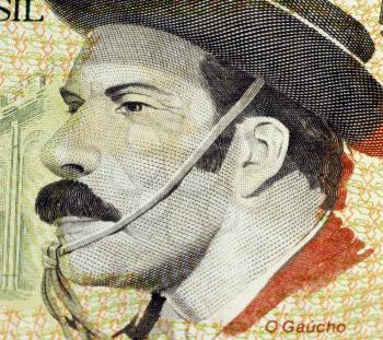 Royalty Free Photo of Cowboy Portrait From South Brazil on 5000 Cruzeiros Reais Banknote