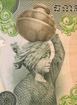 Royalty Free Photo of a Girl with Vessel on Head on 500 Riels Banknote from Cambodia