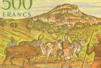 Royalty Free Photo of Herdsmen with Zerbus on 500 Francs 1995 Banknote from Madagascar.